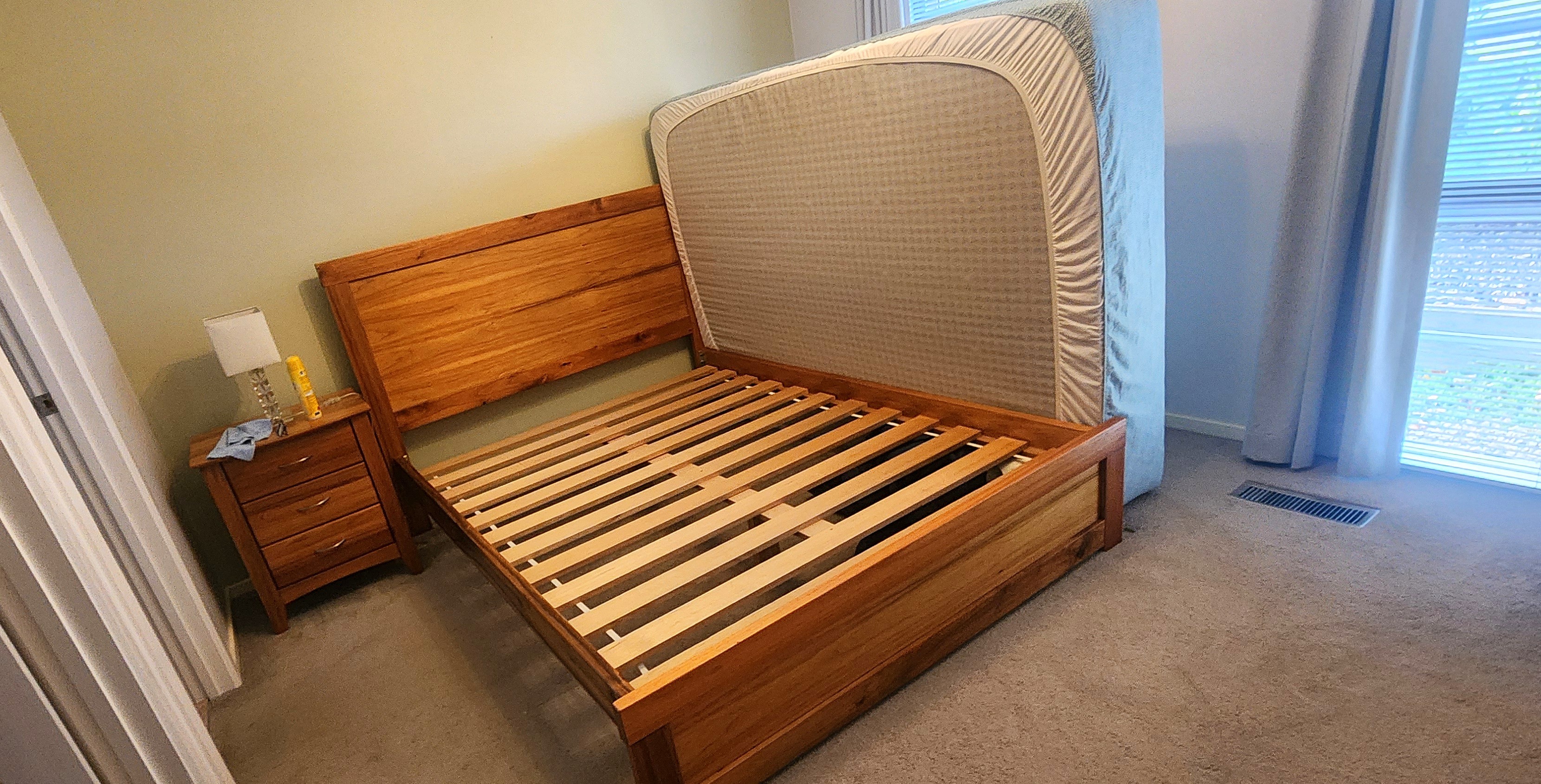 Australian-made bed after the footboard was reworked to match the bed head